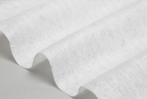 Nonwoven fabric is made by bonding fibers together using heat, chemical treatment, or mechanical pressure.