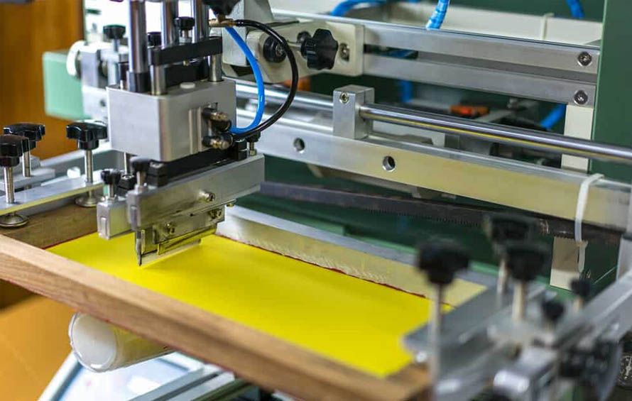 Screen printing uses a mesh stencil to apply durable, vibrant designs on plastic bottles