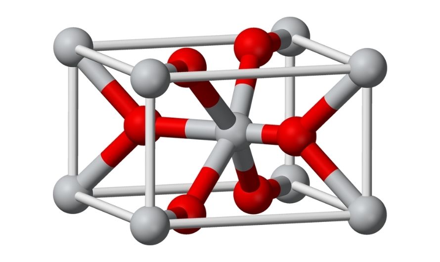 Rutile, a type of Titanium Dioxide, exhibits tetragonal symmetry and features a distorted hexagonal close-packed arrangement